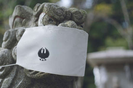 UNESCO World Heritage Site Sacred Sites and Pilgrimage Routes in the Kii Mountain Range Kumano Sanzan, Tanabe City, Wakayama Prefecture Kumano Hongu Taisha Komainu with Yatagarasu masksのeditorial素材