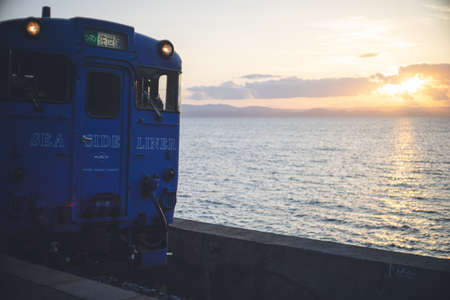 Evening view of Chiwata Station, Nagasaki, Japan, which is located right by the sea and has a great view.の写真素材