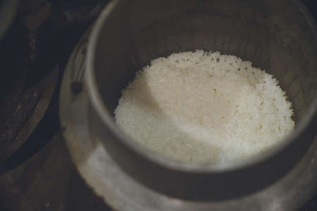 Delicious rice cooked in the kamado in the earthen kitchen of an old Japanese houseの写真素材