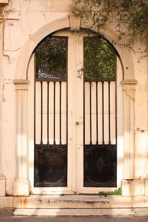 Old door, plants and ancient wall in Turkeyの写真素材