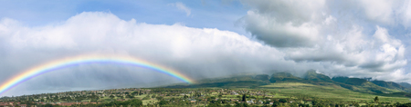 Kaanapali - The image is looking toward Maui, Hawaii western mountains with a rainbow.の写真素材