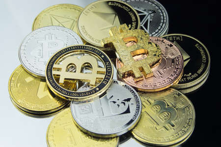 A pile of BITCOINS! Cryptocurrency background Ethereum Litecoin Zcash Bitcoin coins digital.の写真素材