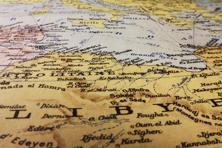 North Africa Libya old vintage paper map Tripoli Tunisia Mediterranean Sea. Shot of a part of a map Africa continent Sahara movingの写真素材