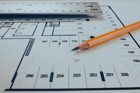 Ruler blueprint and pencil Creativity
Pencil and ruler on a technical drawing of a house project.