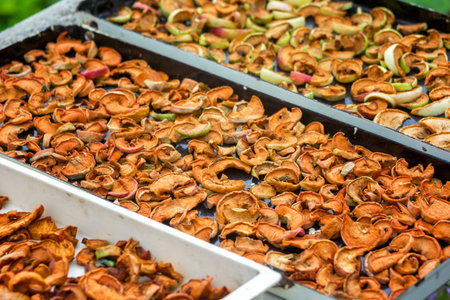drying apples on the street in the village handmade blanks for compote for the winter dried fruits
