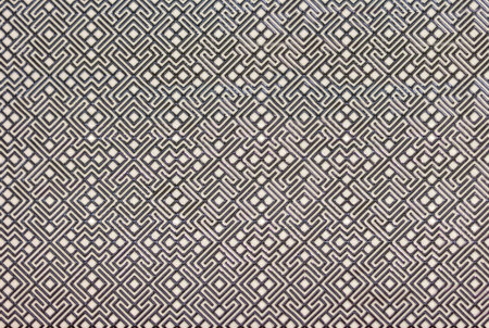 ceramic tile with black and white graphic pattern, geometric ornament of thin lines