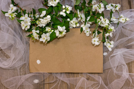 Kraft brown paper background place for text on a wooden background with a white grid and fresh white...