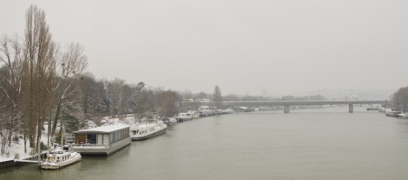 standing ships in water in winterの写真素材