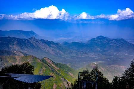 Beautiful mountain range with clouds of sunlightの写真素材