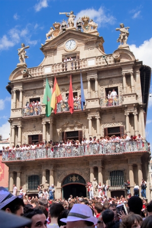 PAMPLONA, SPAIN -JULY 6  People on the balcony of the municipality on the opening day of the festival of San Fermin  Pamplona, Navarra, Spain 6 July 2011 in Pamplona Spain  Noonのeditorial素材