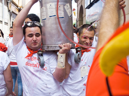 PAMPLONA, SPAIN -JULY 6  Young people having fun at the opening of the San Fermin festival in plaza Castilio  Pamplona, Navarra, Spain 6 July 2012 in Pamplona  のeditorial素材