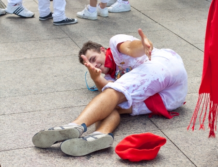 PAMPLONA, SPAIN -JULY 6: Young people having fun at the opening of the San Fermin festival in plaza Castilio. Pamplona, Navarra, Spain 6 July 2012 in Pamplona. のeditorial素材