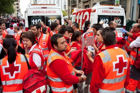 PAMPLONA, SPAIN-JULY 8: Medical staff, ambulance, on San Fermin festival in the street Estafeta. Pamplona, Navarra, Spain 8 July 2012 in Pamplona.のeditorial素材