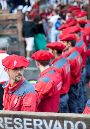 PAMPLONA, SPAIN -JULY 9: Police officers working at the festival of San Fermin. Pamplona, Navarra, Spain 9 July 2011 in Pamplona Spain.のeditorial素材