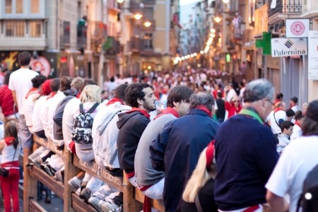 PAMPLONA, SPAIN -JULY 9: A crowd of unknown people in anticipation of beginning a run of bulls in the street Estafeta at the festival of San Fermin in Pamplona, Spain on July 9, 2011.
のeditorial素材