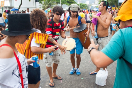 RIO DE JANEIRO - FEBRUARY 11: Street musicians to free people's carnival in Rio de Janeiro February 11, 2013, Brazil. Av. Vieira Ð¡Ð¾uto along Ipanema Beachのeditorial素材