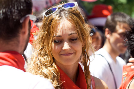 PAMPLONA, SPAIN-JULY 6: Beautiful woman at opening of San Fermin festival. Plaza Consistorial in front of municipality. Pamplona, Navarra, Spain July 6, 2013のeditorial素材