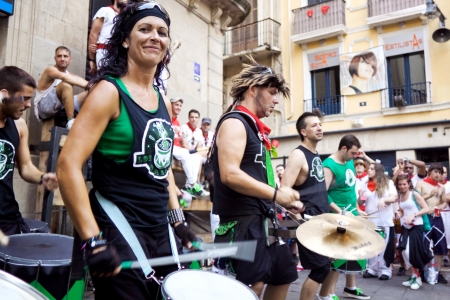 PAMPLONA, SPAIN - JULY 9: Drummers are on street during of festival San Fermin festival. Pamplona, Navarra, Spain July 9, 2013のeditorial素材
