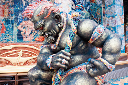 NAKHONRATCHASIMA PROVINCE, THAILAND - FEBRUARY 20: Sculpture of mythical creatures in temple Ban Rai, Thailand, February 20, 2014. Temple is residence of  personal Confessor of king of Thailandのeditorial素材