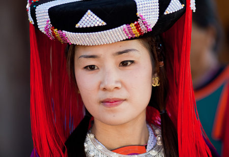 LISU, THAILAND - FEBRUARY 7: Young women in national costumes during Spring Festival (Chinese New...