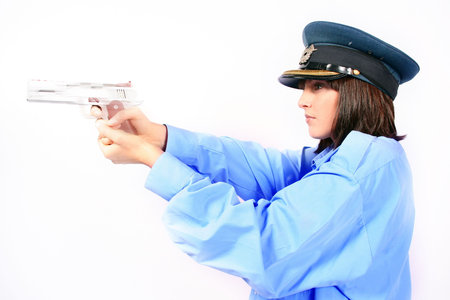 fonny cop or police woman with a silver gunの写真素材