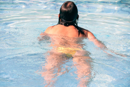 Woman at poolの写真素材