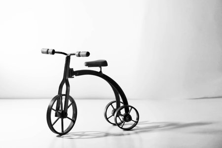 A shot of a tiny toy tricycleの写真素材