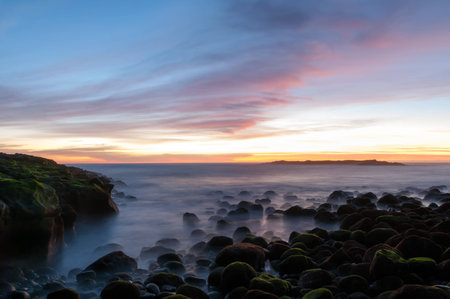 A shot of the moonrise in the coast of Teldeの写真素材