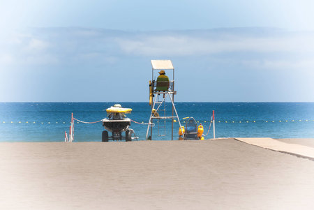 A shot of a lifeguard in a beachの写真素材