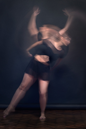 Young ballerina motion blur movingの写真素材