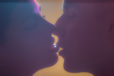 colorful colors intimate kiss kissing couple two people head face close-upの写真素材