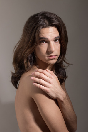 Young Male female man woman transgender Transsexual portraitの写真素材