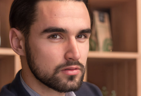 face head close up young man 20s, black beard, black hair handsome retouched skin