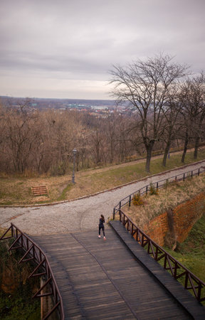 one young woman portrait, runner in winter.
