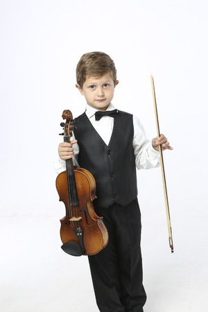 Young boy with violinの写真素材