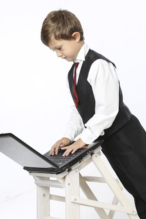 Young businessman on a computerの写真素材