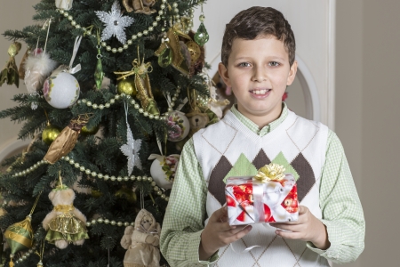 Boy with Christmas giftの写真素材