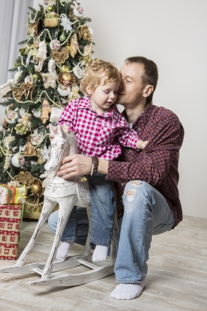 Father and son Christmas tendernessの写真素材