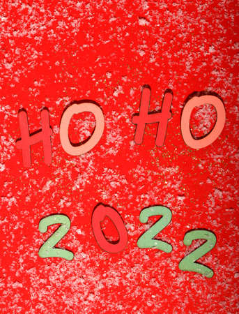 New year funny greeting card on red background, 2022の写真素材