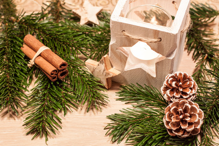 Christmas table decoration - wooden tealight with Christmas decorationの写真素材
