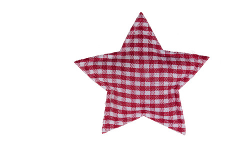 Christmas Decorations - Isolated, red and white star of checkered fabricの写真素材