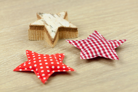 Christmas decoration - Various stars out of wood and fabricの写真素材