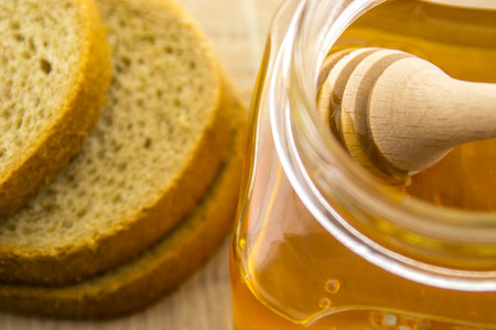 Honey and breadの写真素材