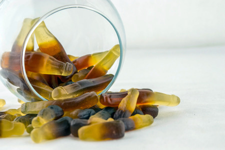Colorful candy rubber bear on a white background.の写真素材