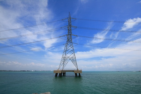 High voltage power pole  in the seaの写真素材