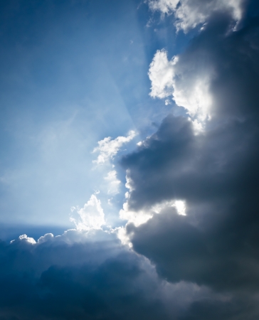 Sun rays through the cloudsの写真素材