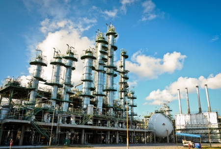 column tower in petrochemical plant and blue skyの写真素材
