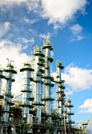 column tower in petrochemical plant and blue skyの写真素材