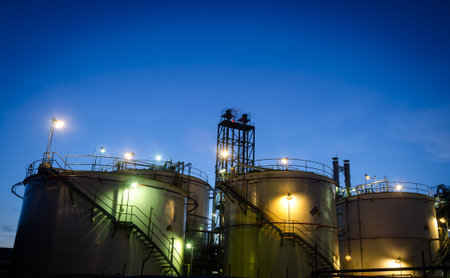 Storage tanks at twilight in petrochemical plant