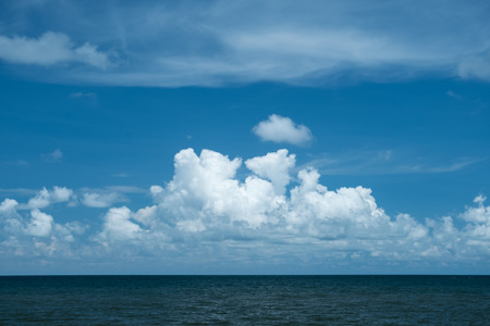 beautiful cloud with blue sky background and sea.の写真素材